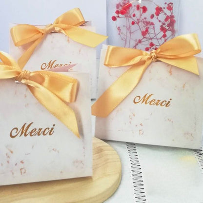 Sacs cadeaux invités "Merci"