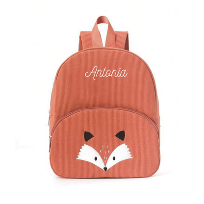 Photo de face d'un sac à dos en velours modèle renard,montrant sa texture côtelée et sa douceur.
