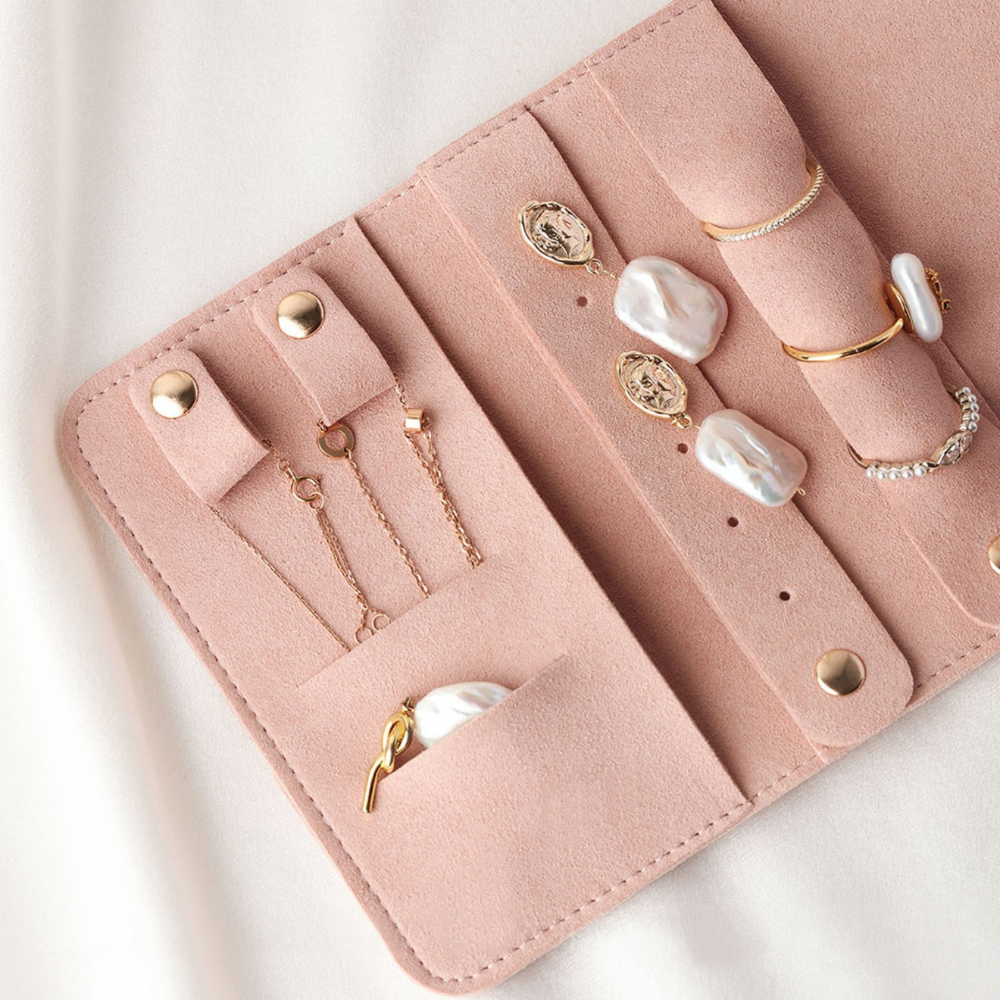 rouleau rangement bijoux de voyage rose