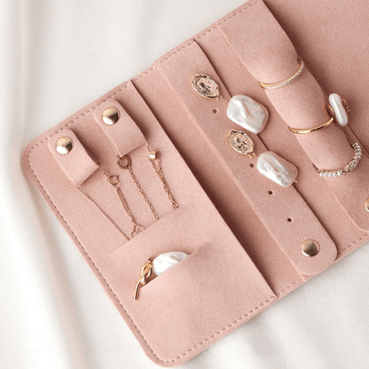 rouleau rangement bijoux de voyage rose